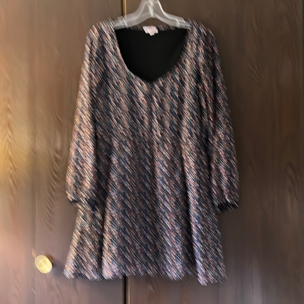 Bongo sheer, long sleeved sheer dress with black lining. Size 9